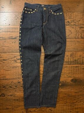 Dolce and Gabbana dark jeans with gold rivets